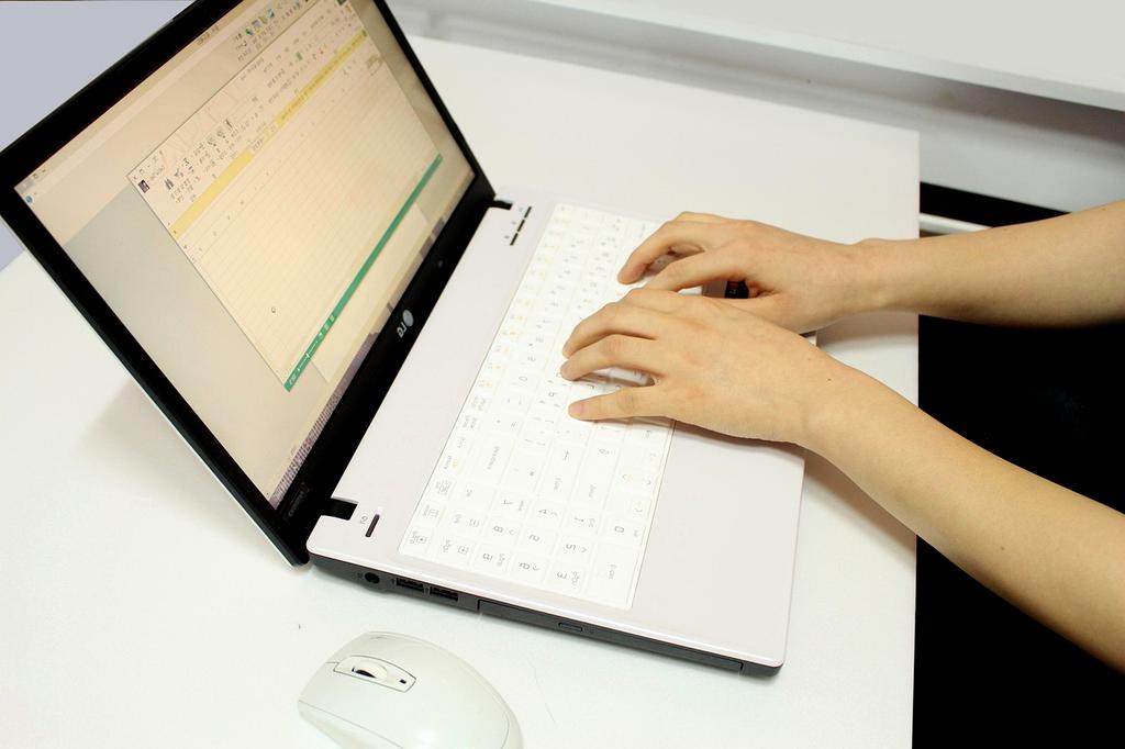 Tablet displaying cloud document syncing interface