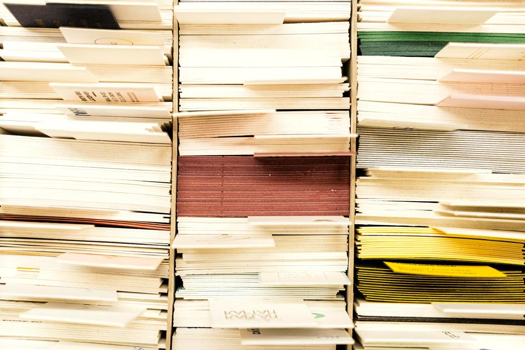 Person scanning documents using smartphone